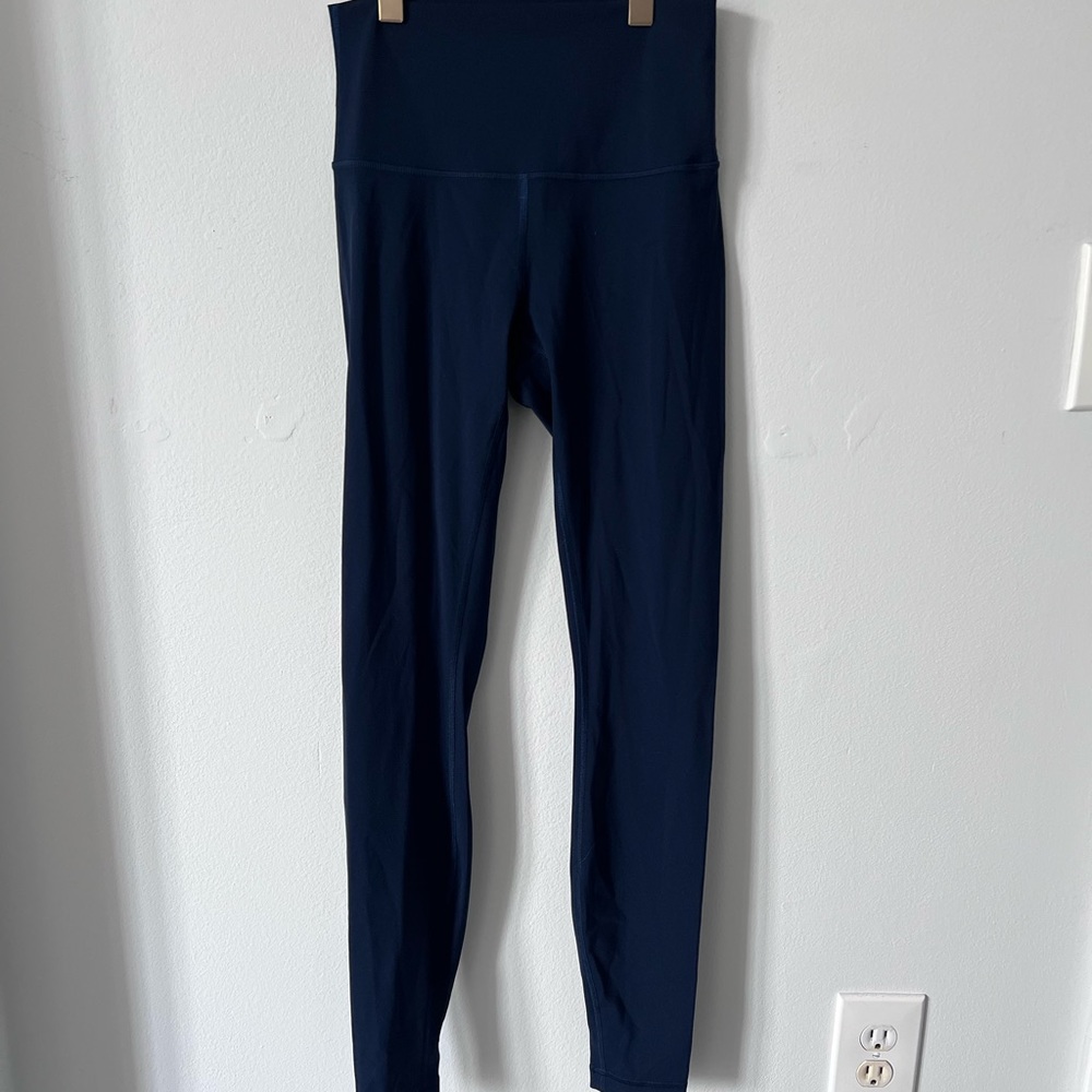 Dark blue Lululemon high-waisted leggings. Size 4.